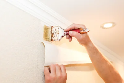 Pose de papier peint à Molèdes — revêtements muraux et toiles de verre